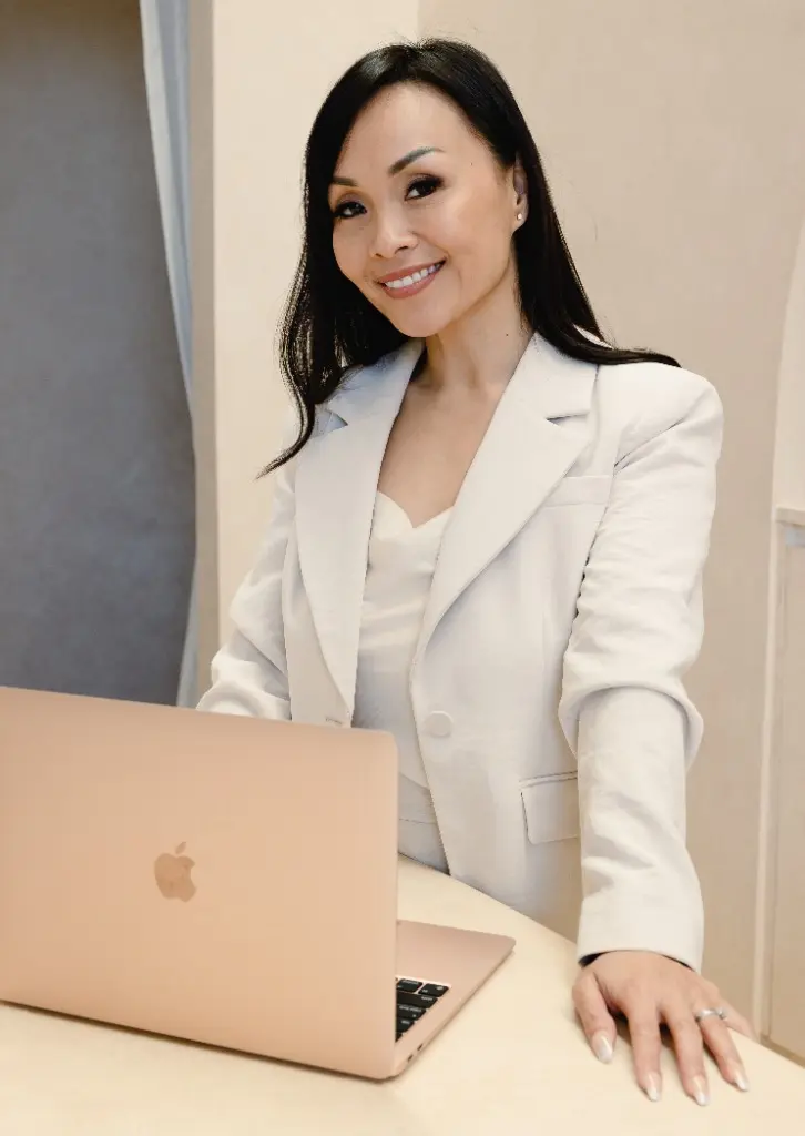 Linh at her laptop